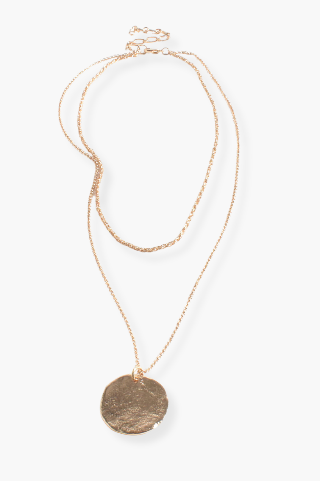 Gold necklace with a round pendant on a white background