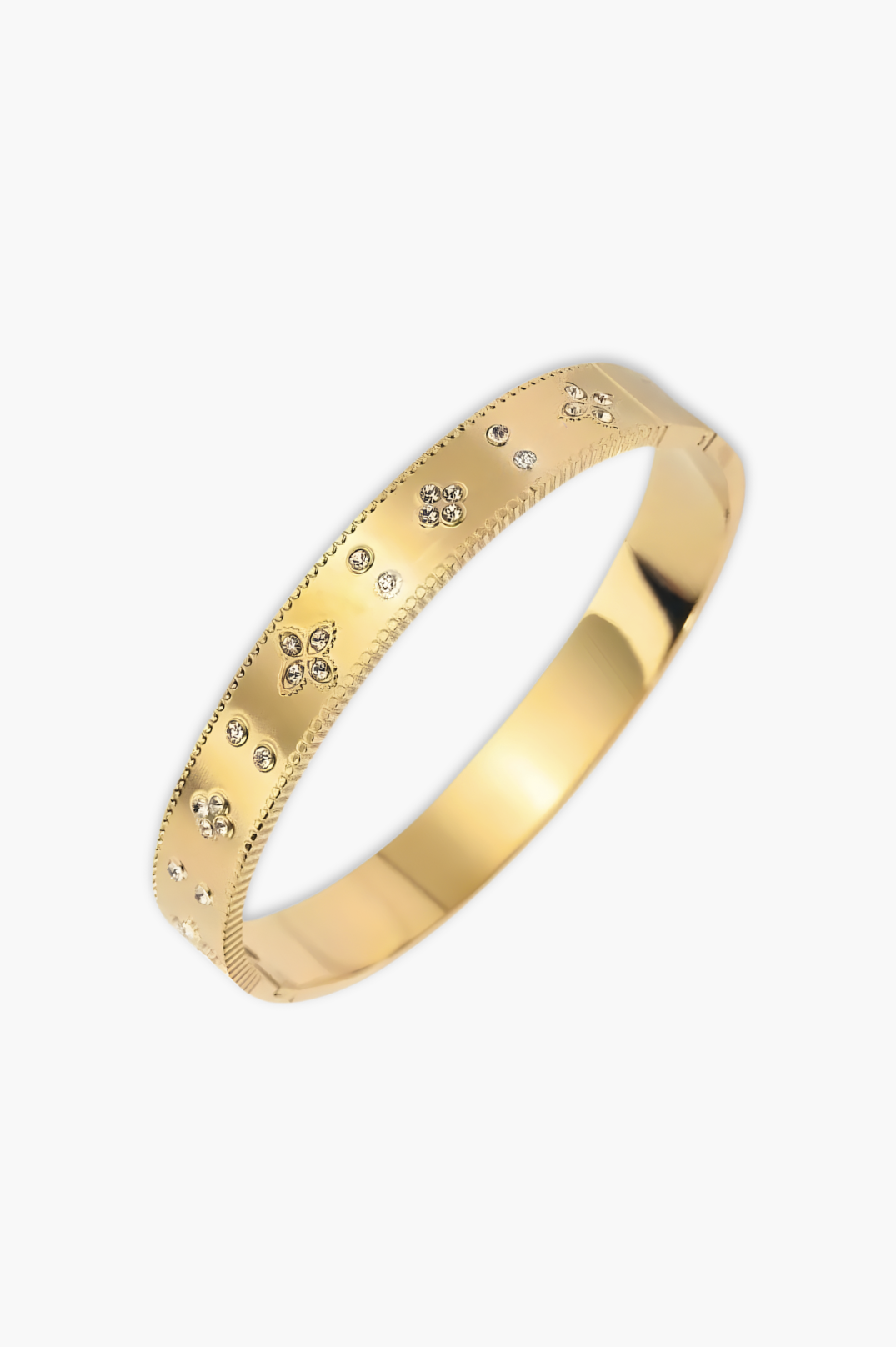 Close-up of Marseilles Bangle – tarnish-free 18K gold plated shine and smooth design,  bangle with diamond accents on a white background