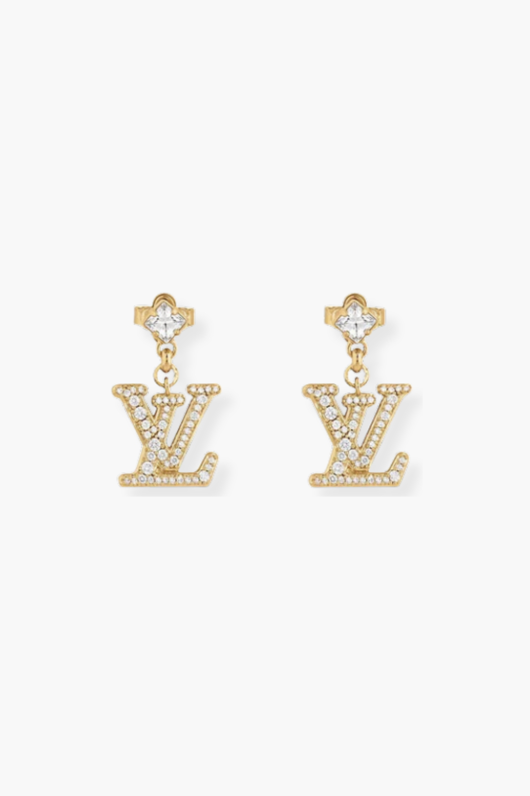 Gold earrings on a white background