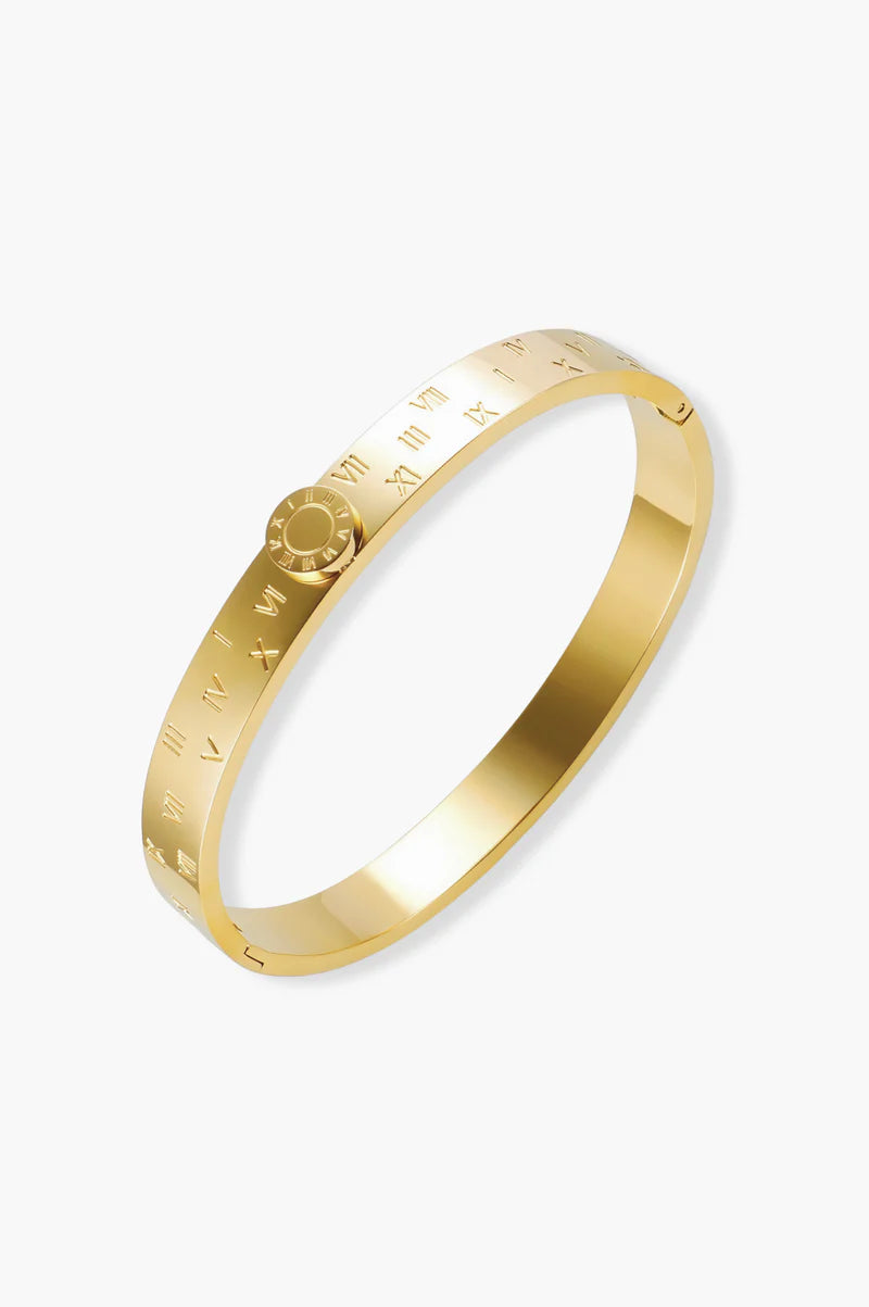  Numerals Bangle – tarnish-free 18K gold plated finish with fine detailing with engraved design on a white background